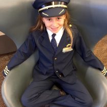 Look at what a little cutie we found at the airport! Future Captain, right there!